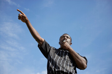 Soccer Referee Making a Call