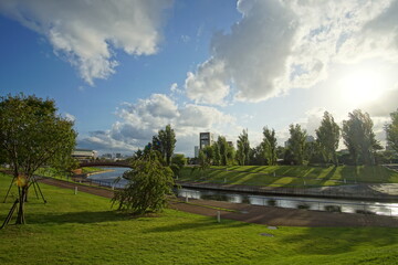 Beautiful Japanese garden with a pond and trees, leaves, nature landscape in Toyama castle, Japan