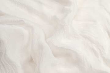 Soft smooth white silk fabric background. Fabric texture.