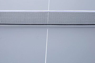 Net of table tennis ping pong on grey background