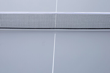 Net of table tennis ping pong on grey background