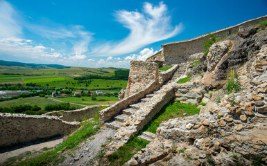 medieval fortress with brick walls and ramparts