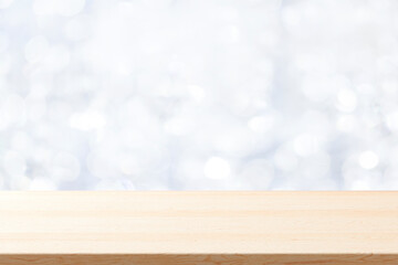 Wood table top on white bokeh abstract background.