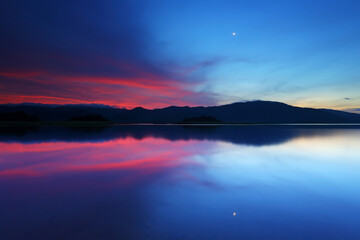 Sunrise over in water reservoir, Eastern Thailand

