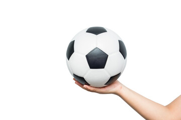 Young man holding classic leather soccer ball isolated on white background. Traditional black and white football equipment to play a competitive game. This photo can be used for sport concept.