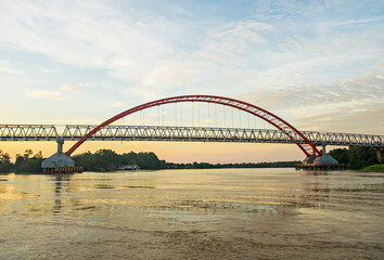 Obraz premium Kahayan Bridge, icon and landmark of Palangka Raya city, the biggest bridge over Kahayan River.