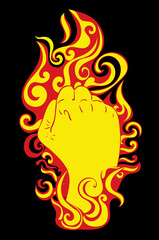Raised fist in fire