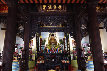 Hoi An, Vietnam, February 21, 2020: Image of Buddha in Chùa Chúc Thánh temple. Hoi An, Vietnam