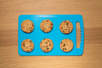 TOP VIEW: Cookies on a blue board