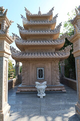 Hoi An, Vietnam, February 23, 2020: Pagoda at the entrance to the cemetery of the Chùa Phước Lâm temple. Hoi An, Vietnam
