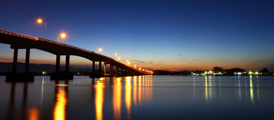 Panoramic view of bridge over the sea at beautiful sunrise on the east, Thailand