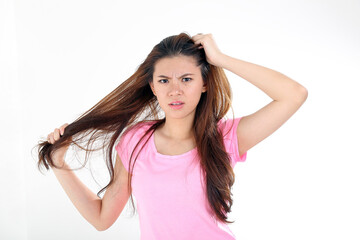 Fototapeta premium beautiful young south east Asian Chinese woman messy bad hair angry upset