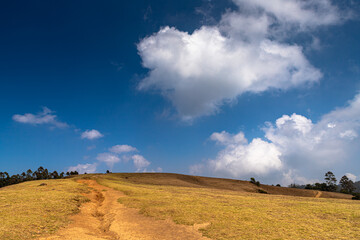 a couple and the dramatic blue sky  at Pykara shooting point