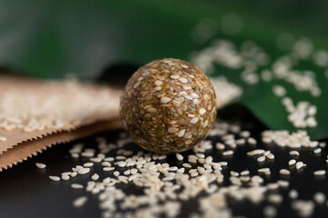 Chocolate candy with sesame close-up on the table
