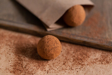 Homemade sweet chocolate truffle with cocoa powder