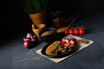 Buckwheat groats baked in the oven with beef goulash