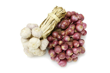 A bunch of garlic with red shallots isolated on a white background