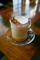 cup of cappuccino with chocolate