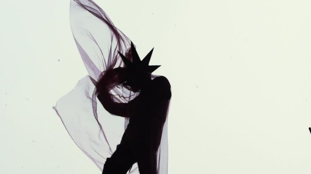 Dark Horror Goth Mesmerizing Artistic Silhouette of Human With Bizarre Halloween Costume Dancing Body Movement in Super Slow Motion Fashion