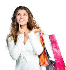 Pretty young woman holding shopping bags