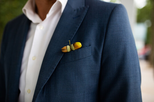 acorn in the groom's jacket pocket