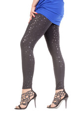 Sexy stylish legs in shimmering black leggins