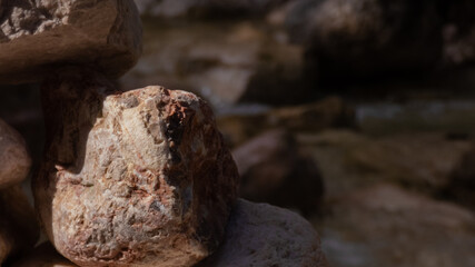 Stone with river in background