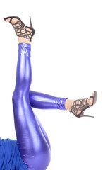 Sexy stylish legs in shimmering blue leggins