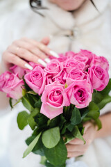 bridal bouquet of pink roses, bride holding bouquet
