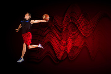 Basketball player with a ball