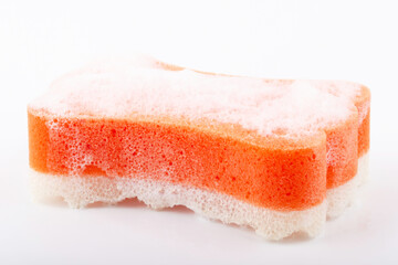 Sponge isolated on the white background. Top view. Cleaning and housewashing concept.