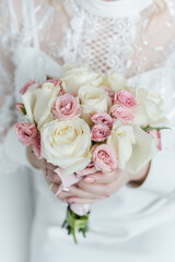 bride holding bouquet, the bride's bouquet, bride in wedding dress