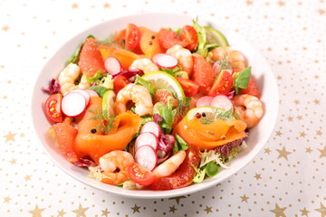 smoked salmon salad with shrimp, radish, tomato and grapefruit