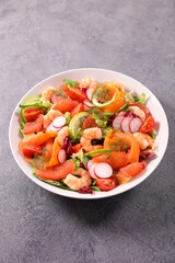 smoked salmon salad with shrimp, radish, tomato and grapefruit