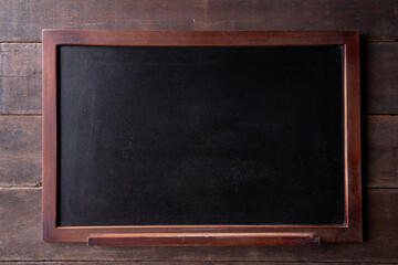 mini blackboard on wood background