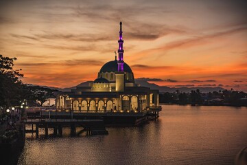 The floating mosque of Kuching and The Darul Hana Bridge during sunset