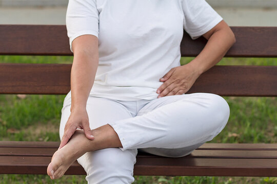 A Woman Practicing Jin Shin Jyutsu, A Japanese Self-helping Therapy