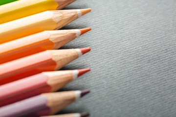 pencils on gray background close-up in macro