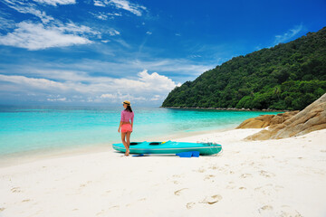 Woman in sunglasses at beach