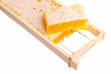 Sealed honeycomb of honey in a wooden frame
