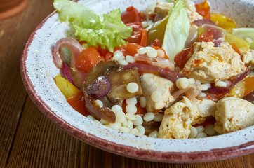 Israel  Ptitim casserole with chicken and vegetables