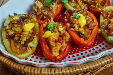 Stuffed red bell peppers with ptitim