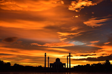 Sunset view with beautiful golden sky At Masjid in the middle of Songkhla Province, the colorful sky lights in the evening