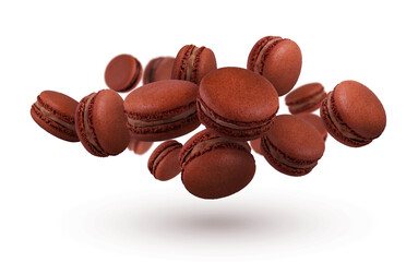 Chocolate macaroons fly on a white background. Beautiful macaroons.