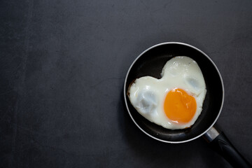 Pan omelette on black background