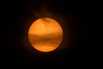 sun covered with clouds © Piotr_Kardas
