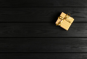 top view gift box on a black wooden background