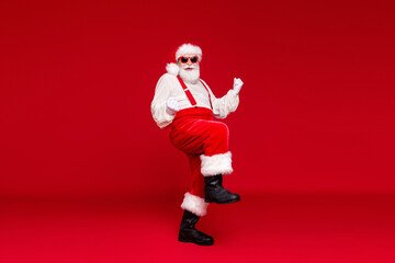 Fototapeta na wymiar Full length body size view of handsome cheerful cheery funny bearded Santa dancing enjoying rest festal day celebratory rejoicing isolated bright vivid shine vibrant red color background