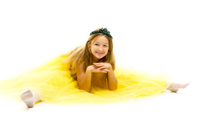 Little girl is sitting on the floor.The concept of a happy child