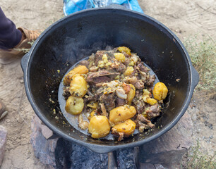 Dimlama - a Turkic stew made from various combinations of meat, potatoes, onions, vegetables, and sometimes fruits in the open nature